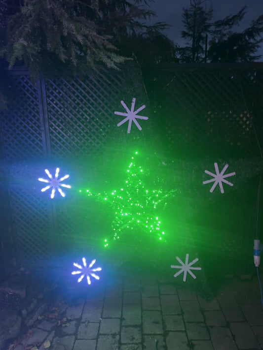 Large Green star with flashing snowflakes